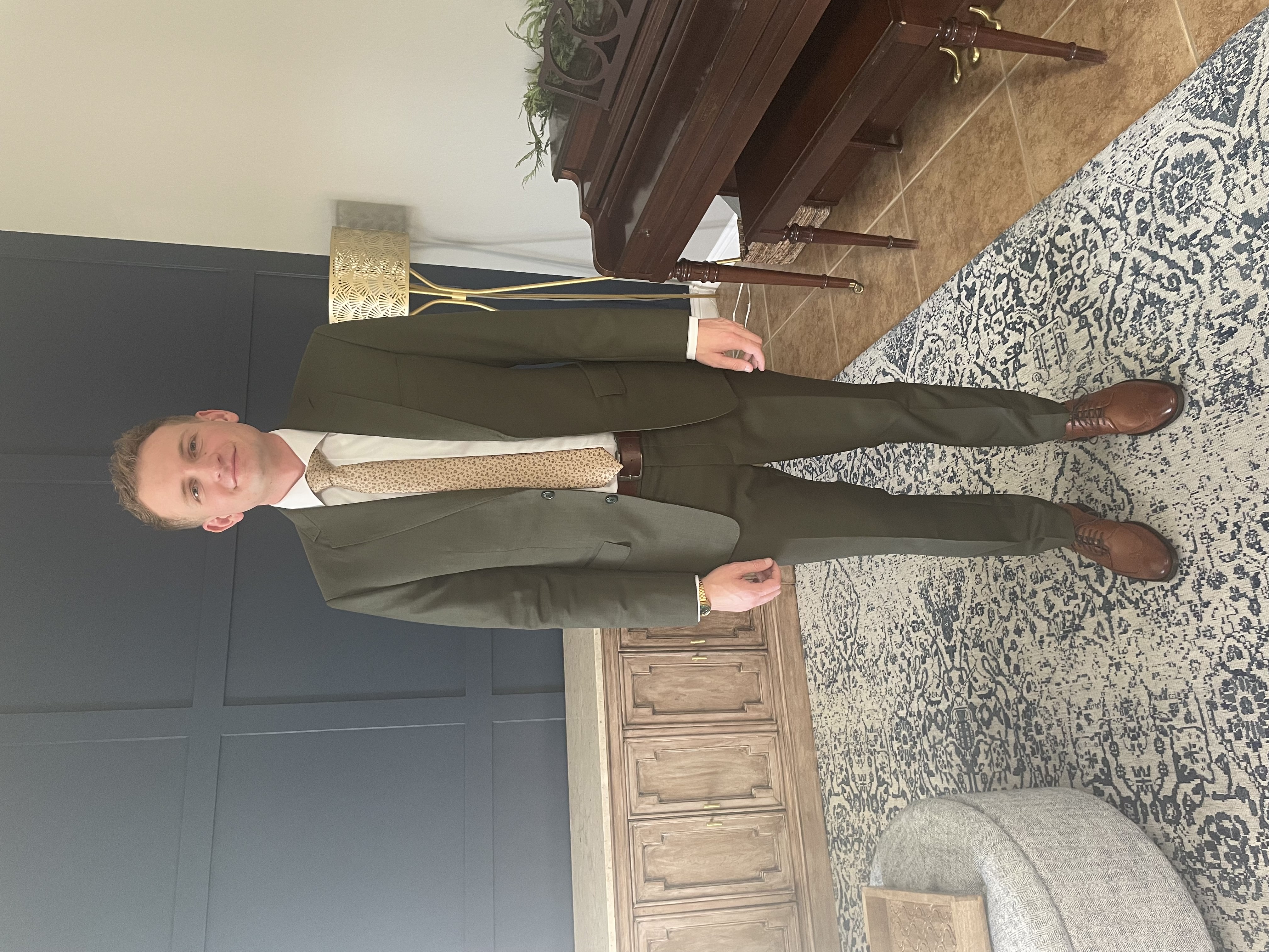 Distinguished olive green bespoke suit demonstrating contemporary styling and expert craftsmanship from Essato Custom Clothing in Layton, Utah