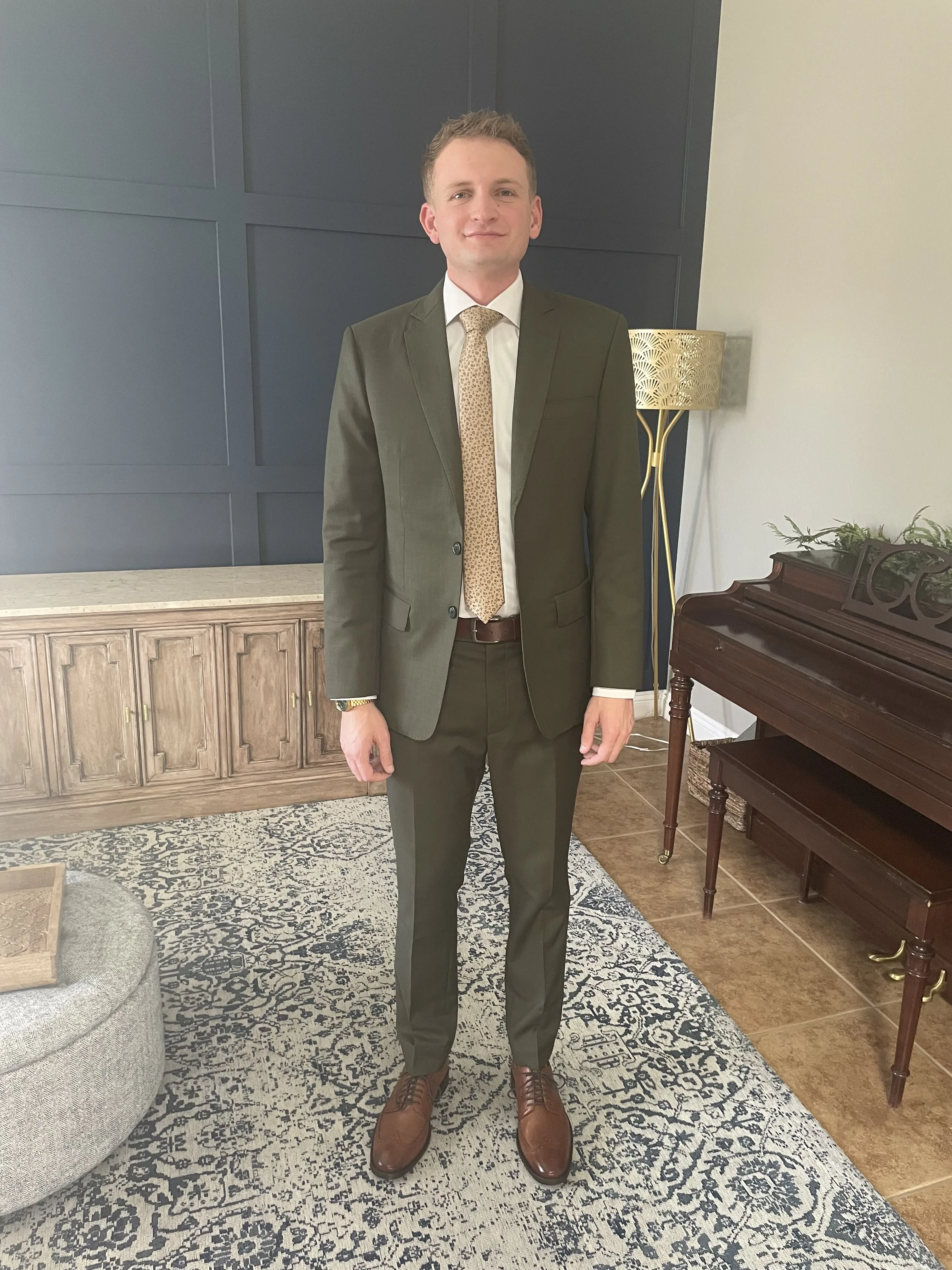 Distinguished olive green bespoke suit demonstrating contemporary styling and expert craftsmanship from esatto Custom Clothing in Layton, Utah