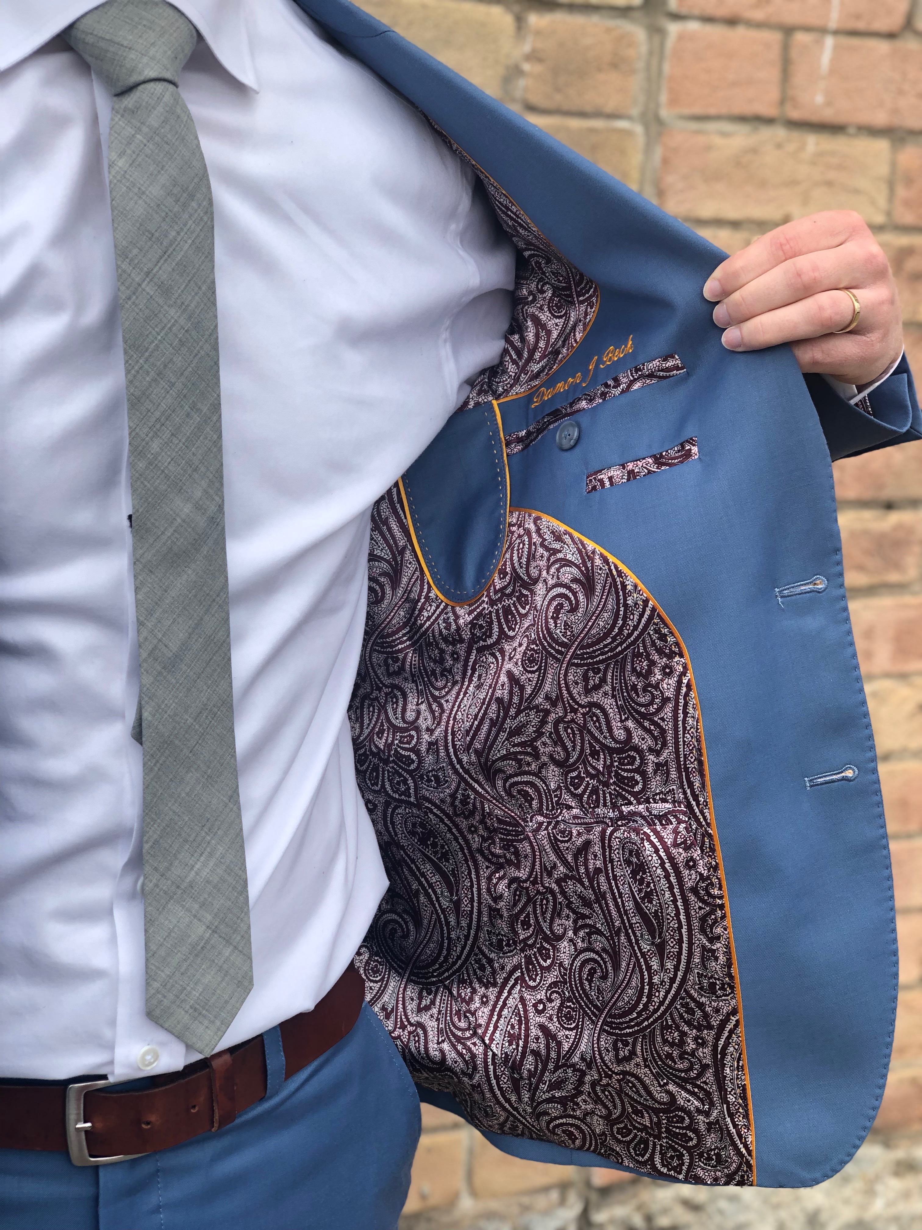 Premium suit jacket lining showcasing the luxurious interior details and superior craftsmanship of Essato Custom Clothing in Layton, Utah