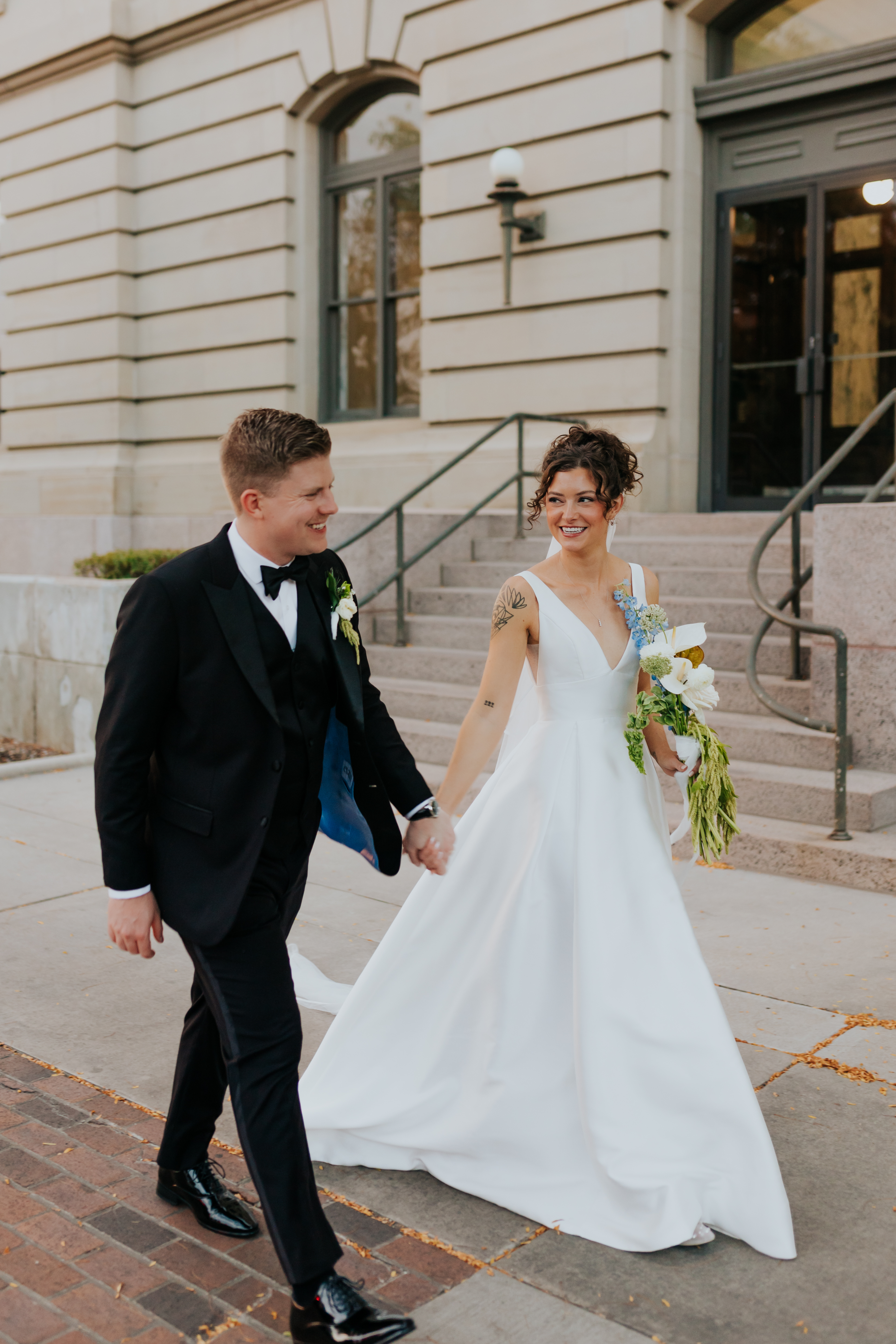 Stunning wedding couple wearing bespoke formal wear, featuring custom suit and elegant styling by Essato Custom Clothing in Layton, Utah