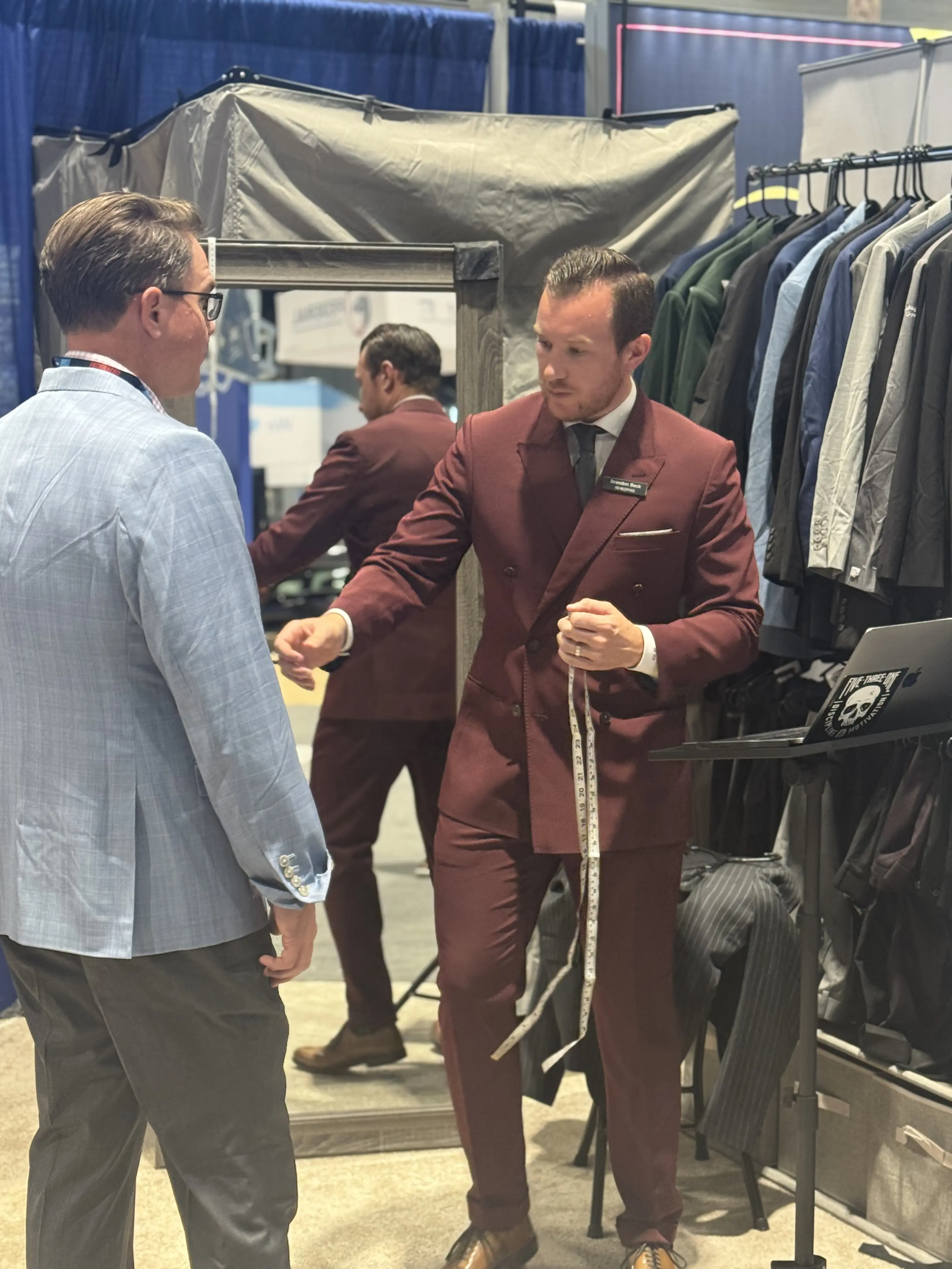 Brandon Beck, Head Clothier and founder of esatto Custom Clothing, demonstrating expert tailoring in Layton, Utah